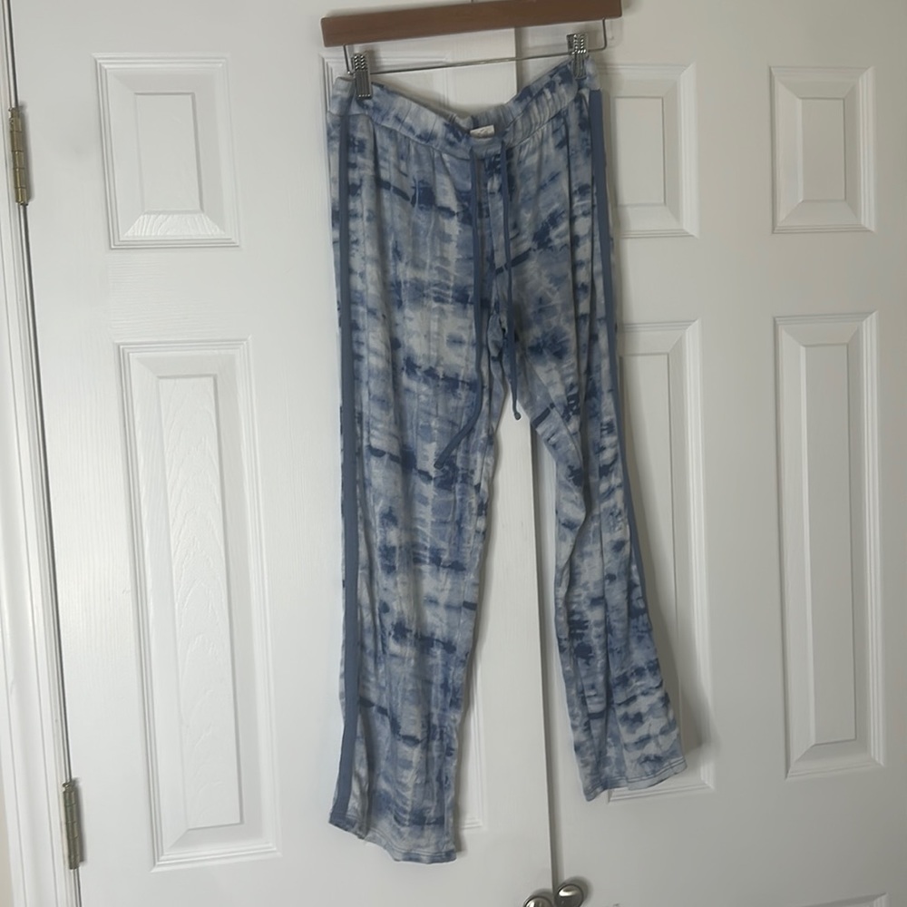 Blue tie dye pajama bottoms with tie around the front